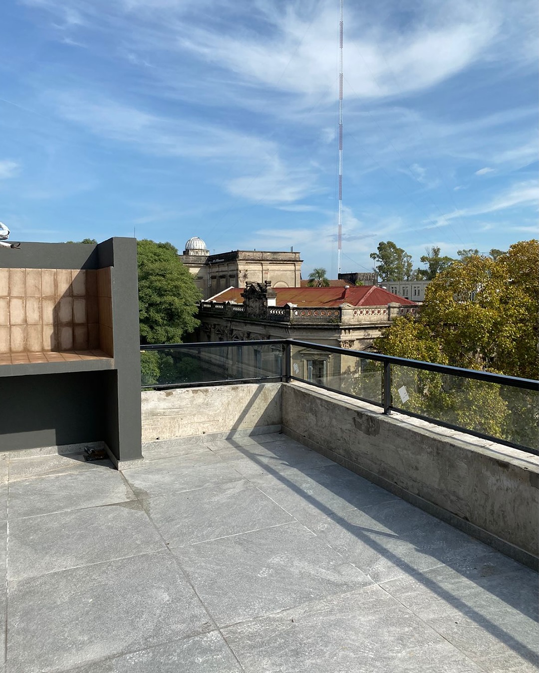Terraza con parrilla